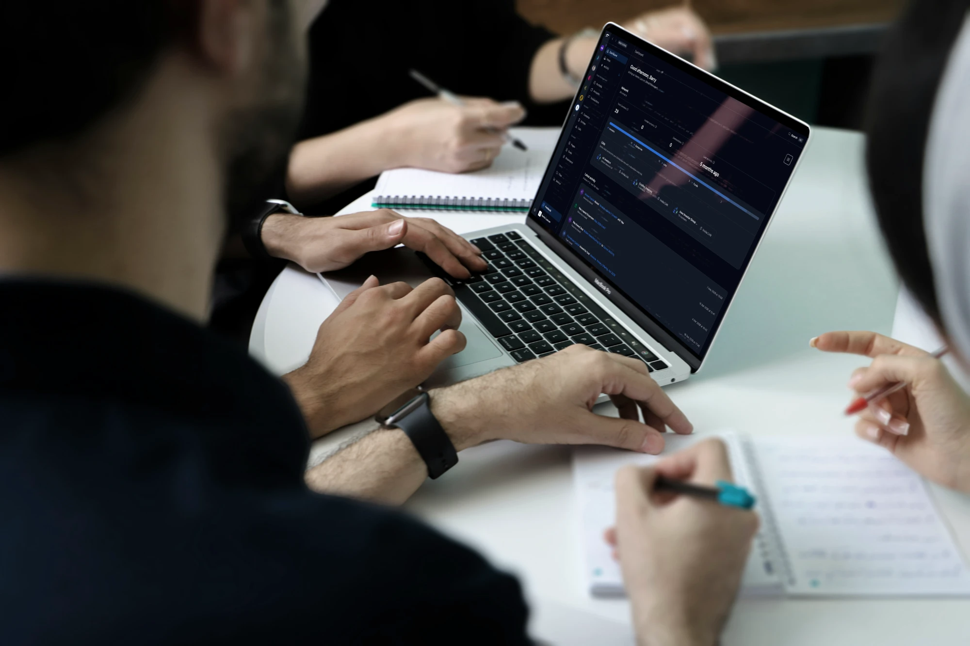 A broker-dealer team reviewing the cost of compliance