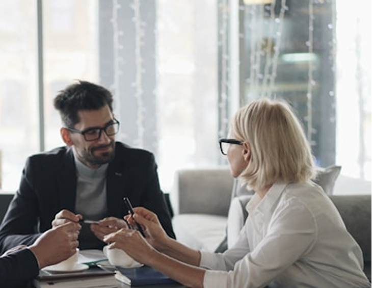 An adviser in conversation with a client